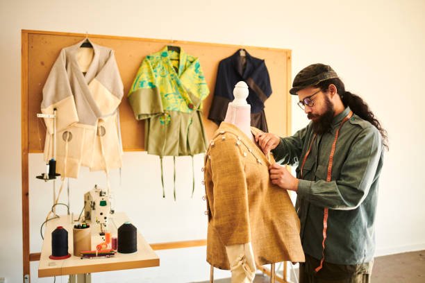 male fashion designer working on his garment